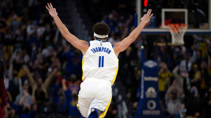 Golden State Warriors guard Klay Thompson (11) celebrates his 1800th career three-point basket